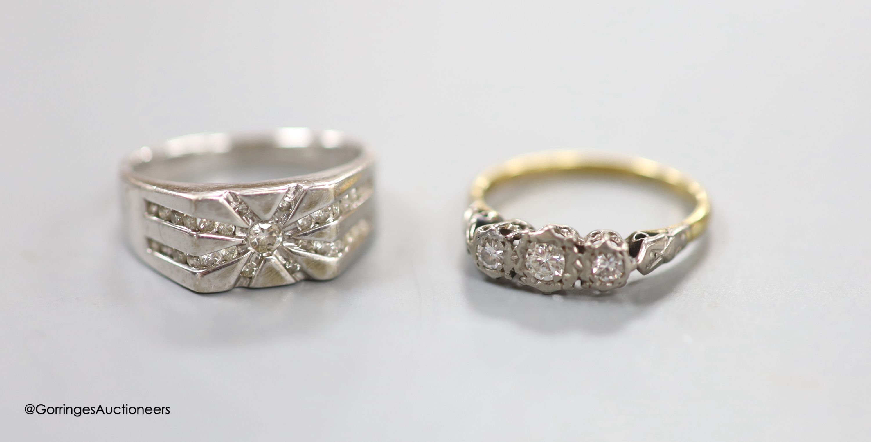 A diamond-set 14ct white gold ring, size R, gross 5.7 grams and an illusion-set three-stone diamond ring, 18ct gold shank, size P, gross 2.5 grams.